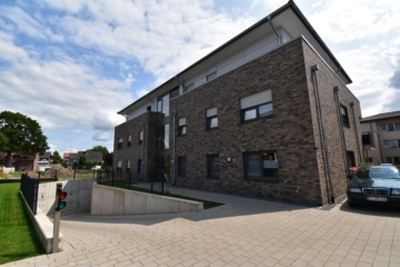 Eingangsbereich und TG- Einfahrt - Neubau- Eigentumswohnungen in zentraler Lage