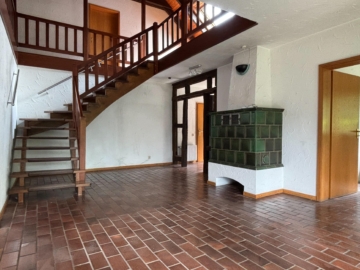 Galerie mit Kachelofen - Einfamilienhaus mit vermieteter Einliegerwohnung und idyllischem Garten***4215 G in Steinhagen