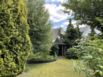mit idyllischen Sitzplatz im hinteren Bereich - Charmantes Familienhaus mit Gartenidylle und viel Potenzial im Herzen Neuenkirchens *4209 G