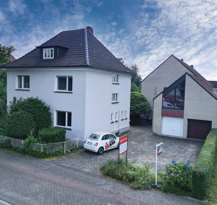 Außenansicht - Zwei in Einem: Einfamilienhaus mit vielseitig nutzbarem Gewerbeobjekt***4135 G in GT-Isselhorst