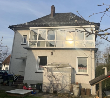 Einfamilienhaus Rückansicht - Zwei in Einem: Einfamilienhaus mit vielseitig nutzbarem Gewerbeobjekt***4135 G in GT-Isselhorst