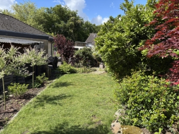 Liebevoll angelegte Gartenbereiche - Familienbungalow mit großem Garten, Vollkeller & Wellnessbereich *4297 G Versmold