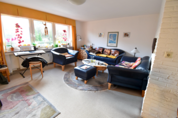 Wohnzimmer im Erdgeschoss - Gepflegtes Dreifamilienhaus ***4253 G in Versmold-Peckeloh